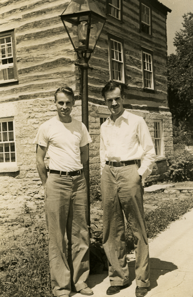 In this sepia tinted historic photo Bob & Edgar stand outside of Pendarvis looking casual